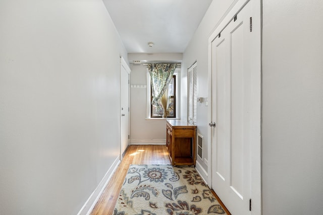 4753 N Talman St Unit 2S, Chicago, IL 60625 - corridor featuring light wood-style floors and baseboards