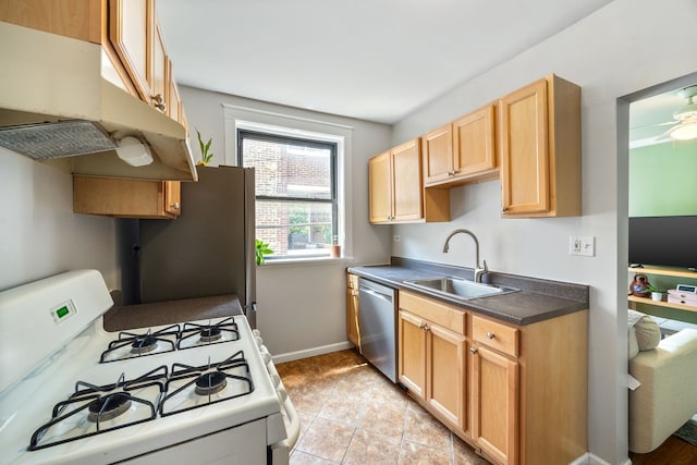 4753 N Talman St Unit 2S, Chicago, IL 60625 - kitchen featuring stainless steel appliances, under cabinet range hood, dark countertops, light brown cabinetry, and ceiling fan