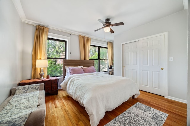 4753 N Talman St Unit 2S, Chicago, IL 60625 - bedroom with wood finished floors, a closet, and ceiling fan