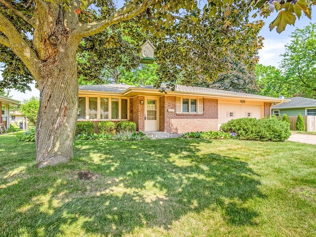 409 Lynne Ln, Belvidere, IL 61008 - view of front of home featuring brick siding