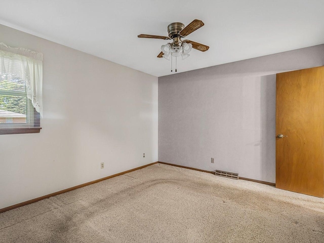 409 Lynne Ln, Belvidere, IL 61008 - unfurnished room with carpet flooring and a ceiling fan