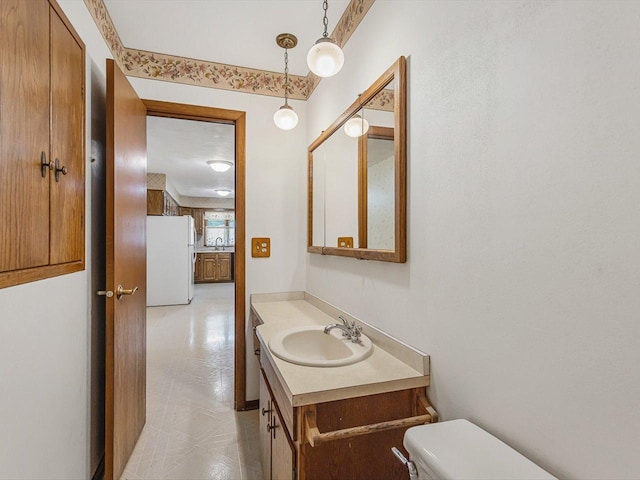409 Lynne Ln, Belvidere, IL 61008 - bathroom featuring vanity and toilet