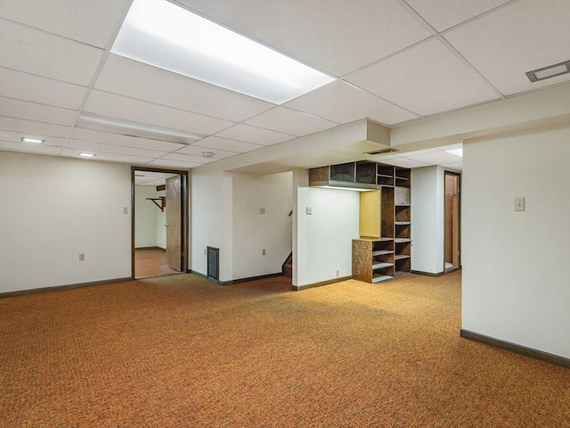 409 Lynne Ln, Belvidere, IL 61008 - finished below grade area featuring carpet flooring, a paneled ceiling, and stairway