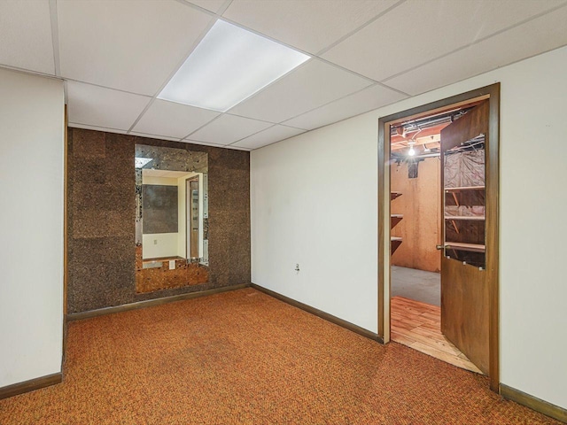 409 Lynne Ln, Belvidere, IL 61008 - carpeted empty room featuring a paneled ceiling