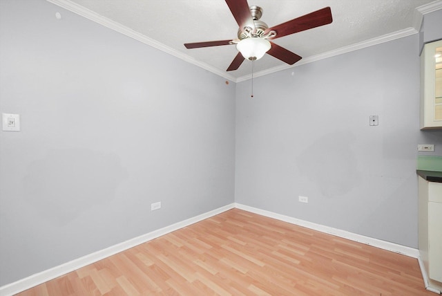 9960 Franchesca Ct Unit 3A, Orland Park, IL 60462 - unfurnished room with light wood-type flooring, ceiling fan, and crown molding