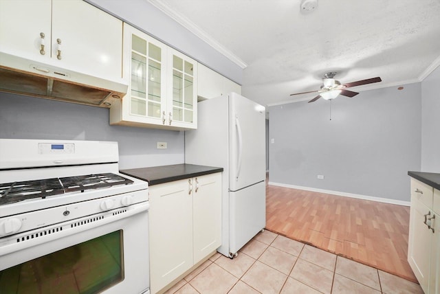 9960 Franchesca Ct Unit 3A, Orland Park, IL 60462 - kitchen featuring white appliances, crown molding, a ceiling fan, dark countertops, and light tile patterned floors