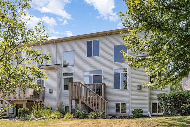 1617 Fieldstone Dr S Unit 13-1, Shorewood, IL 60404 - back of property with stairs and a wooden deck