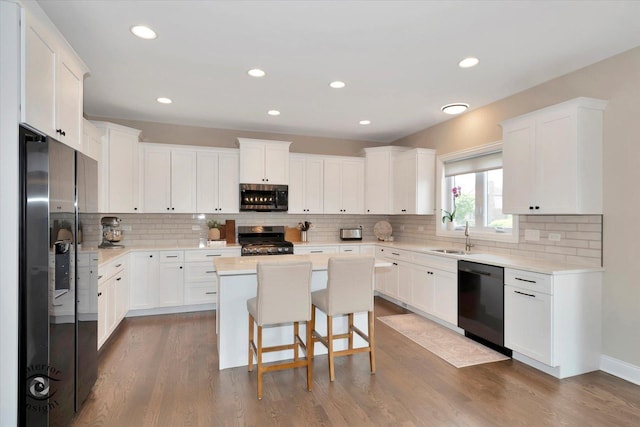 23008 Anna Ln, Frankfort, IL 60423 - kitchen featuring stainless steel appliances, white cabinets, tasteful backsplash, and recessed lighting