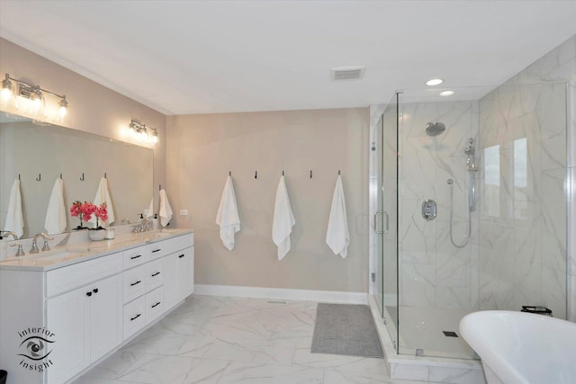 23008 Anna Ln, Frankfort, IL 60423 - bathroom featuring marble finish flooring, a freestanding bath, double vanity, a marble finish shower, and recessed lighting