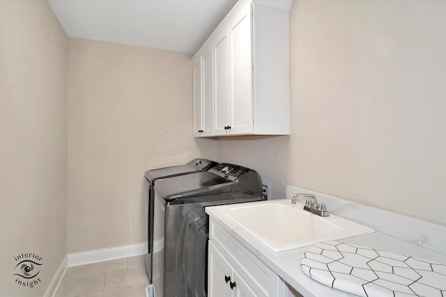 23008 Anna Ln, Frankfort, IL 60423 - laundry area featuring cabinet space, independent washer and dryer, and light tile patterned floors