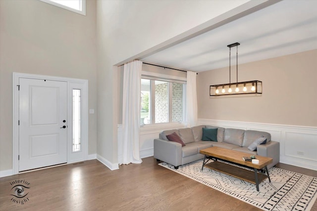 23008 Anna Ln, Frankfort, IL 60423 - entrance foyer with wood finished floors, a high ceiling, and wainscoting
