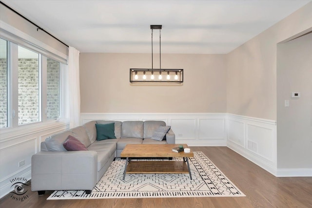 23008 Anna Ln, Frankfort, IL 60423 - living area featuring wood finished floors and a wainscoted wall