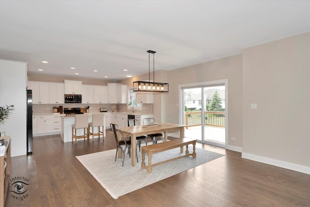23008 Anna Ln, Frankfort, IL 60423 - dining space featuring dark wood finished floors and recessed lighting
