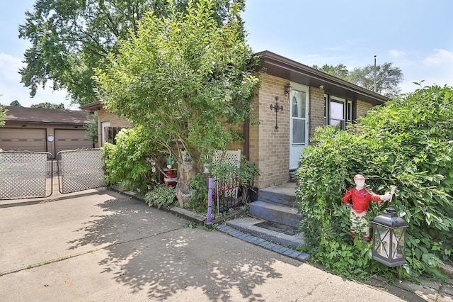 511 Crystal Ave, South Elgin, IL 60177 - view of front facade featuring brick siding and driveway
