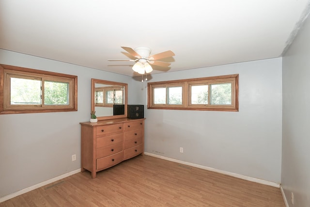 511 Crystal Ave, South Elgin, IL 60177 - bedroom featuring multiple windows, light wood-type flooring, and a ceiling fan
