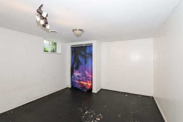 511 Crystal Ave, South Elgin, IL 60177 - spare room featuring concrete floors and baseboards
