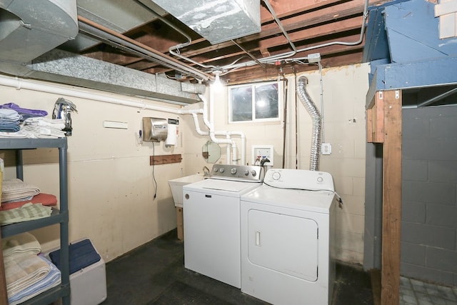 511 Crystal Ave, South Elgin, IL 60177 - laundry area with independent washer and dryer and concrete block wall