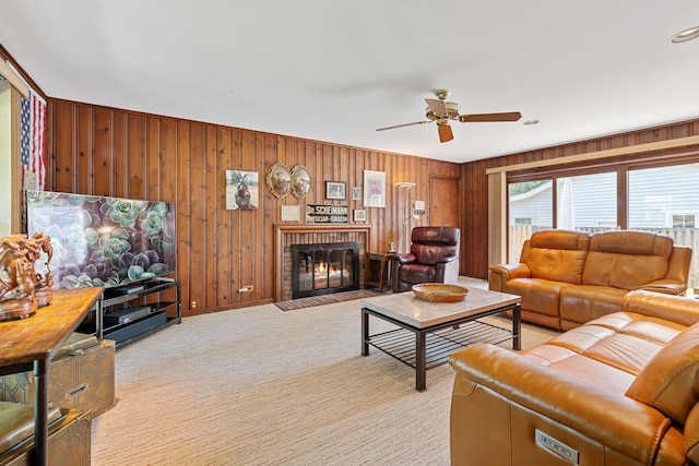 3930 Bordeaux Ct, Northbrook, IL 60062 - living room featuring ceiling fan, wood walls, light colored carpet, and a fireplace
