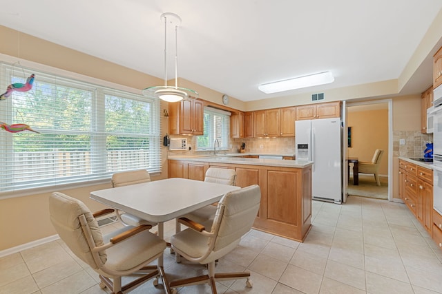 3930 Bordeaux Ct, Northbrook, IL 60062 - kitchen featuring white refrigerator with ice dispenser, tasteful backsplash, light countertops, and light tile patterned flooring