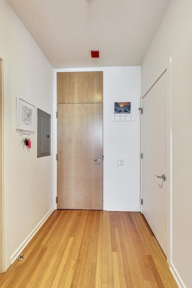 500 W Superior St Unit 1804, Chicago, IL 60654 - unfurnished bedroom featuring electric panel, light wood-type flooring, and a closet