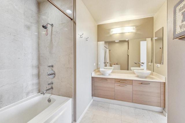 500 W Superior St Unit 1804, Chicago, IL 60654 - bathroom with double vanity, shower / washtub combination, and marble look tile flooring