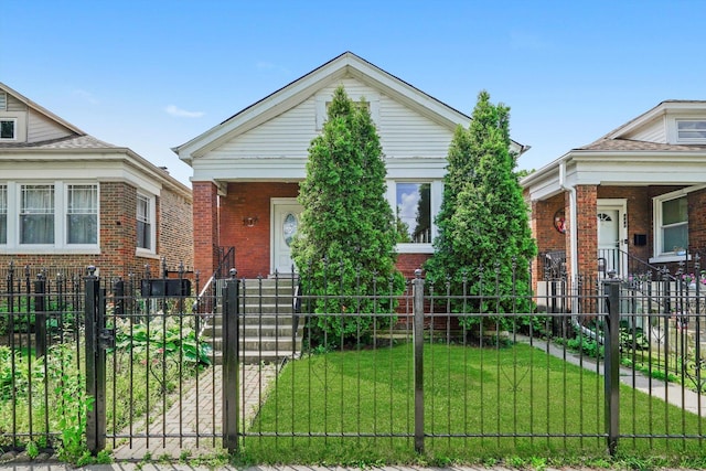 3545 W 62nd Pl, Chicago, IL 60629 - view of front of home featuring a fenced front yard, brick siding, a gate, and a porch