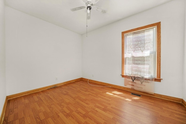 3545 W 62nd Pl, Chicago, IL 60629 - unfurnished room with wood finished floors and ceiling fan