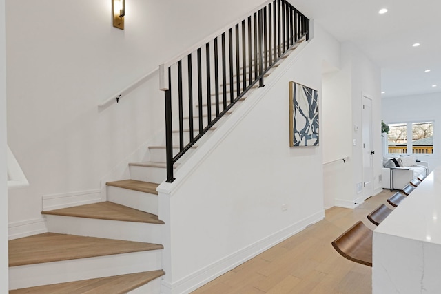 4932 S Martin Luther King Dr, Chicago, IL 60653 - stairway with wood finished floors and recessed lighting