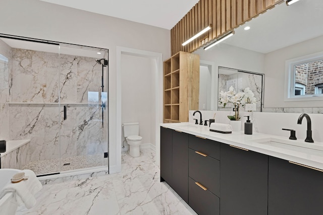 4932 S Martin Luther King Dr, Chicago, IL 60653 - bathroom with a marble finish shower, double vanity, and marble finish flooring