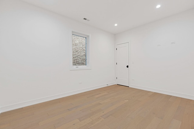 4932 S Martin Luther King Dr, Chicago, IL 60653 - empty room with light wood-style flooring and recessed lighting