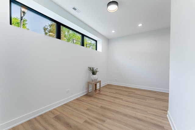 4210 W 5th Ave, Chicago, IL 60624 - unfurnished room with light wood-style flooring and recessed lighting