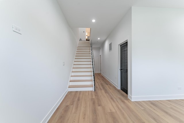 4210 W 5th Ave, Chicago, IL 60624 - staircase with wood finished floors and recessed lighting