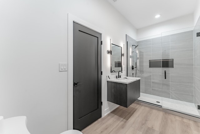 4210 W 5th Ave, Chicago, IL 60624 - full bath featuring a stall shower, vanity, wood finished floors, and recessed lighting