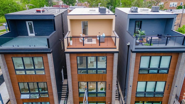 4210 W 5th Ave, Chicago, IL 60624 - rear view of house featuring a balcony