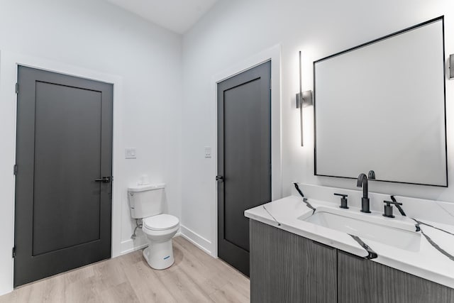 4210 W 5th Ave, Chicago, IL 60624 - bathroom featuring wood finished floors and vanity