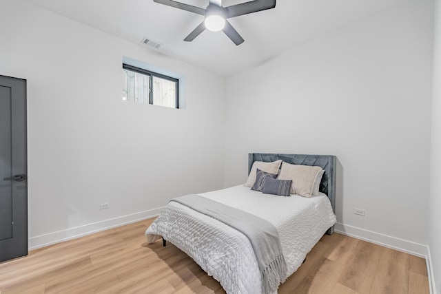 4210 W 5th Ave, Chicago, IL 60624 - bedroom featuring wood finished floors and a ceiling fan