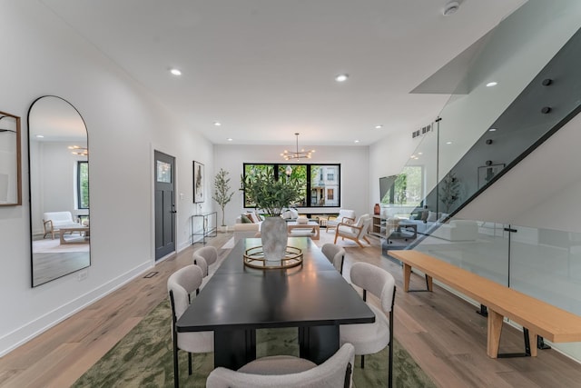 4210 W 5th Ave, Chicago, IL 60624 - dining space with a chandelier, light wood-type flooring, healthy amount of natural light, and recessed lighting