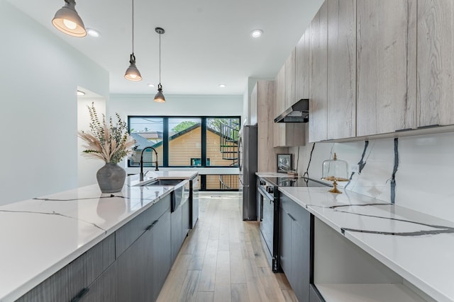4210 W 5th Ave, Chicago, IL 60624 - kitchen featuring electric range, freestanding refrigerator, modern cabinets, and recessed lighting