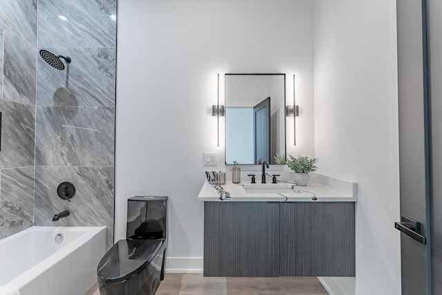 4210 W 5th Ave, Chicago, IL 60624 - full bath with vanity, shower / washtub combination, and wood finished floors