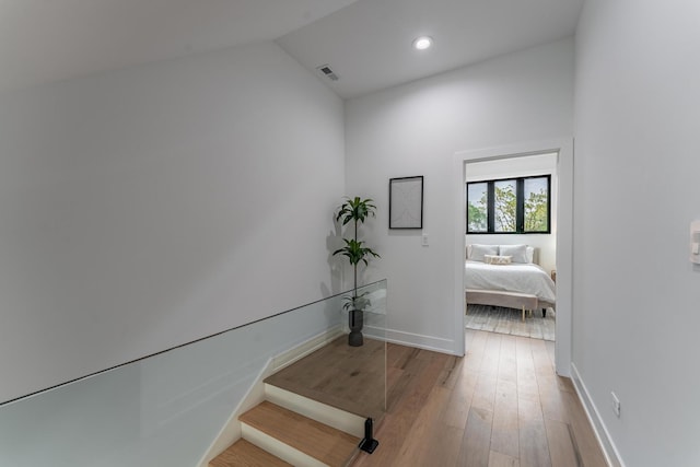 4210 W 5th Ave, Chicago, IL 60624 - hall featuring wood finished floors, lofted ceiling, and recessed lighting