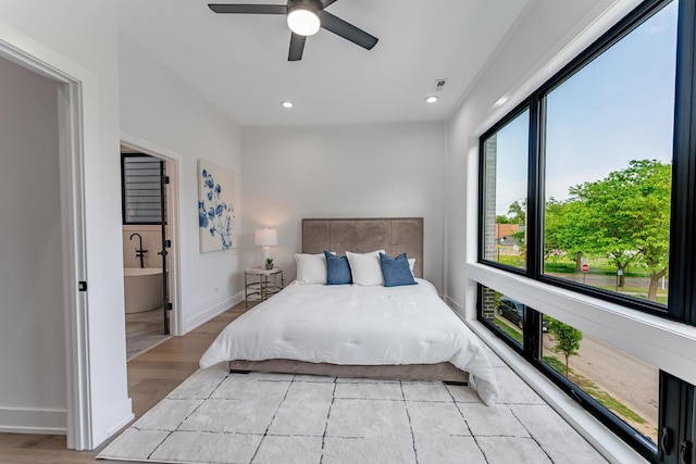 4210 W 5th Ave, Chicago, IL 60624 - bedroom with light wood-style flooring, recessed lighting, and a ceiling fan