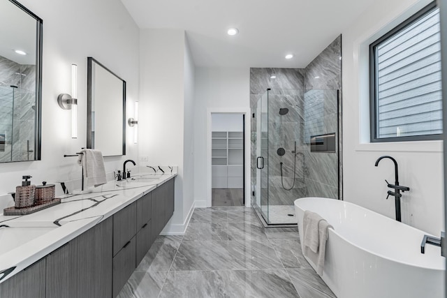 4210 W 5th Ave, Chicago, IL 60624 - bathroom featuring a freestanding tub, a stall shower, marble tiled flooring, double vanity, and recessed lighting