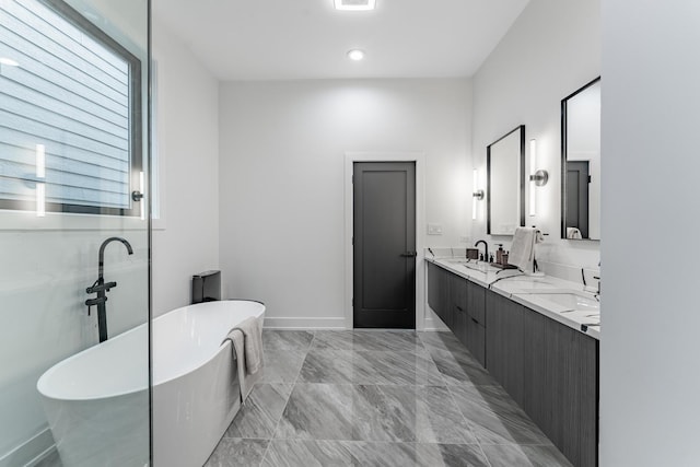 4210 W 5th Ave, Chicago, IL 60624 - full bathroom with double vanity and a freestanding tub