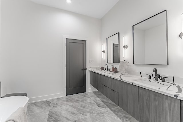 4210 W 5th Ave, Chicago, IL 60624 - full bathroom with double vanity, a freestanding bath, and recessed lighting