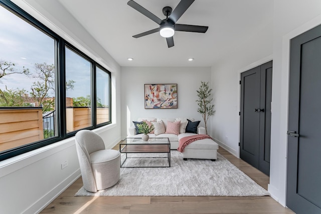 4210 W 5th Ave, Chicago, IL 60624 - living room featuring healthy amount of natural light, ceiling fan, wood finished floors, and recessed lighting