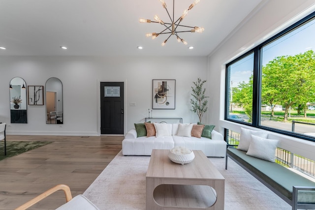 4210 W 5th Ave, Chicago, IL 60624 - living room with recessed lighting, wood finished floors, and a chandelier