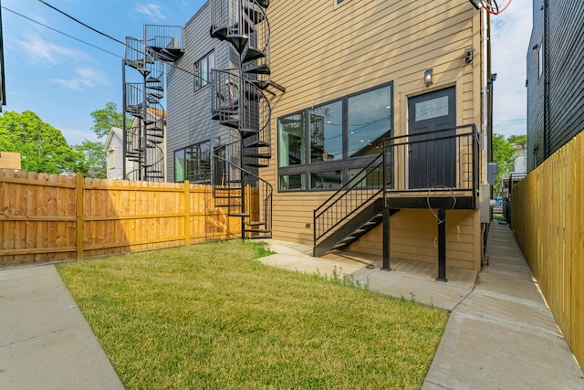 4210 W 5th Ave, Chicago, IL 60624 - view of front facade with stairway and a fenced backyard