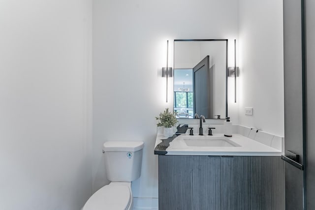 4210 W 5th Ave, Chicago, IL 60624 - half bathroom featuring toilet and vanity