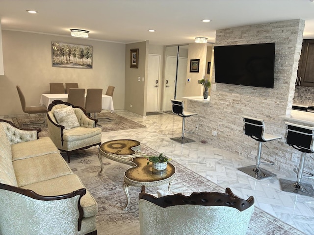 1103 S Hunt Club Dr Unit 125, Mount Prospect, IL 60056 - living room featuring crown molding and recessed lighting