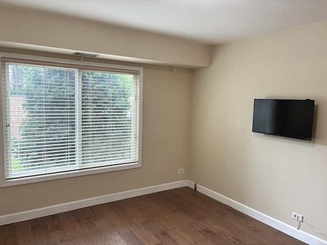 1103 S Hunt Club Dr Unit 125, Mount Prospect, IL 60056 - spare room with dark wood-style floors